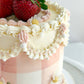 Vintage gingham cake with fresh strawberries